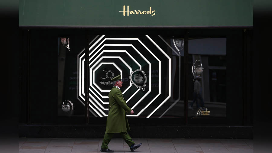 A doorman at Harrods luxury department store in LondonHollie Adams/Getty Images