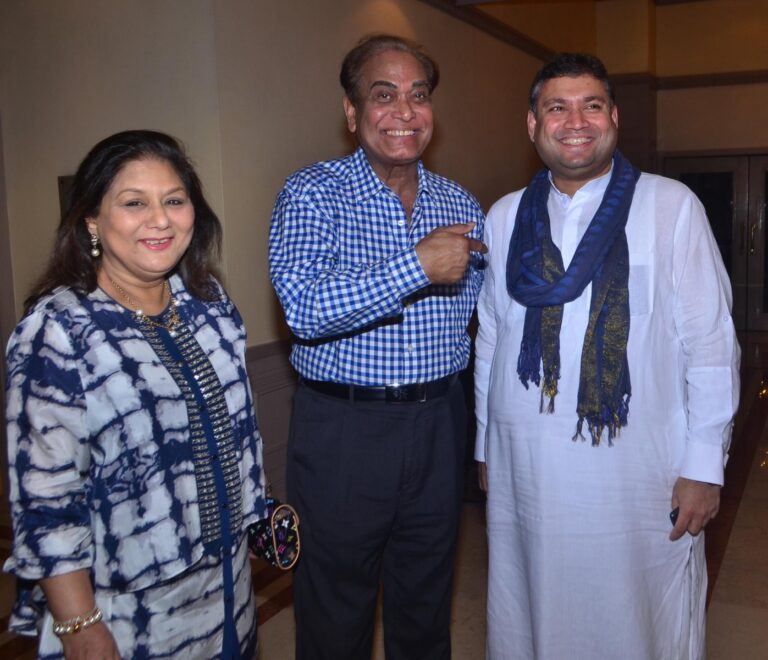 Sundeep Bhutoria with Mr and Mrs Pranab Dasgupta at the celebrations of the book Anything But Khamosh