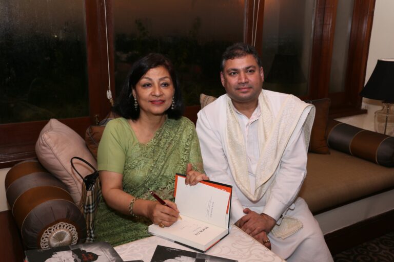 Sundeep Bhutoria with guest author Lady Mohini Kent Noon signing off a copy of her book at An Author's Afternoon session in Kolkata