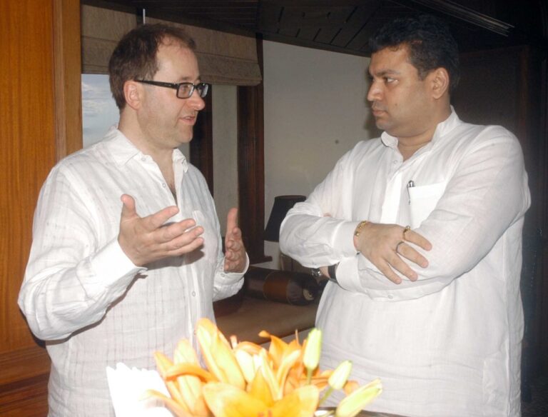 Sundeep Bhutoria with British historian and author, Patrick French, at a party in Kolkata