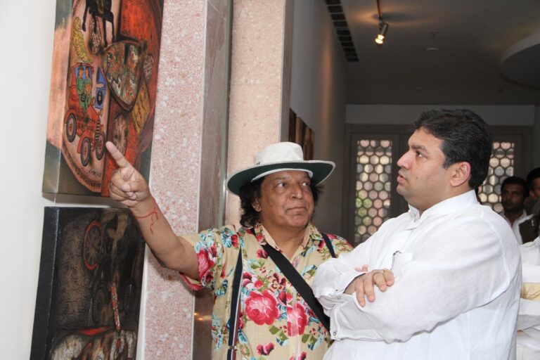 Sundeep Bhutoria with artist Rameshwar Singh at his art exhibition at the ITC Rajputana, Jaipur