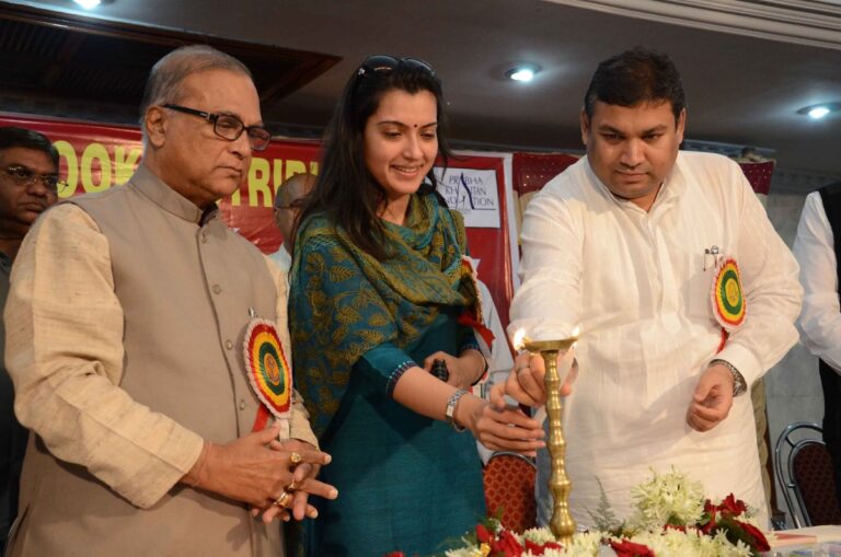 Sundeep Bhutoria formally inaugurating a book distribution function of Bharat Relief Society in Kolkata with Pradip Chatterjee, MP, and Arpita Chatterjee