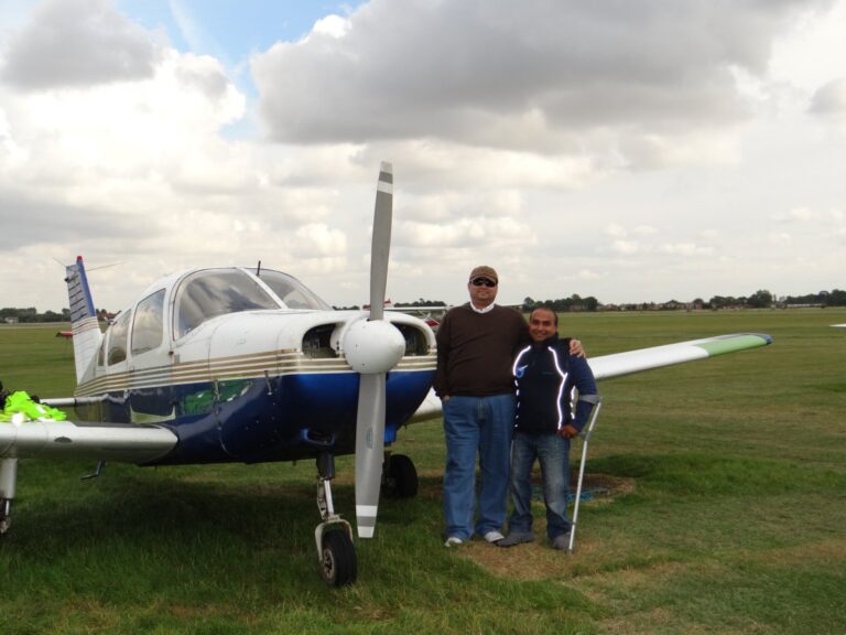 Sundeep Bhutoria with Gautam Lewis at the Cranfield Flying School near London