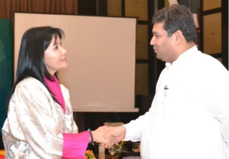 Sundeep Bhutoria shaking hands with Queen Mother, Her Majesty, Ashi Dorji Wangmo Wangchuck in Thimpu