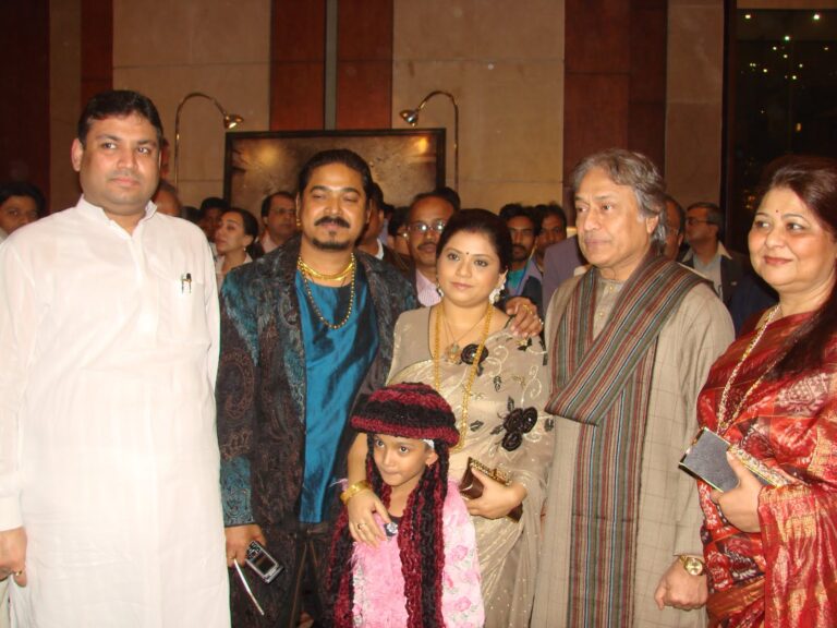 Sundeep Bhutoria with artist Sanatan Dinda and family and sarod maestro, Ustad Amjad Ali Khan and family at Dinda's art exhibition in Kolkata