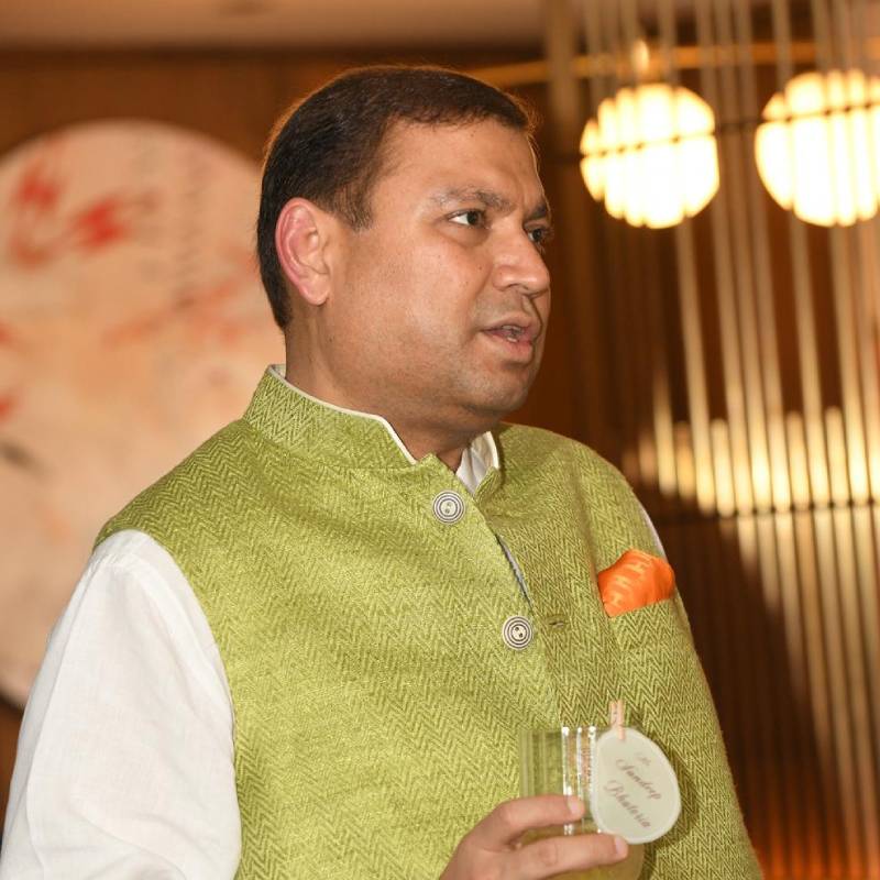 /home/developer/Downloads/sundeepbhutoria/Sundeep Bhutoria engaged with a diverse group of individuals from various fields of Arts over tea at The Taj Chambers in London