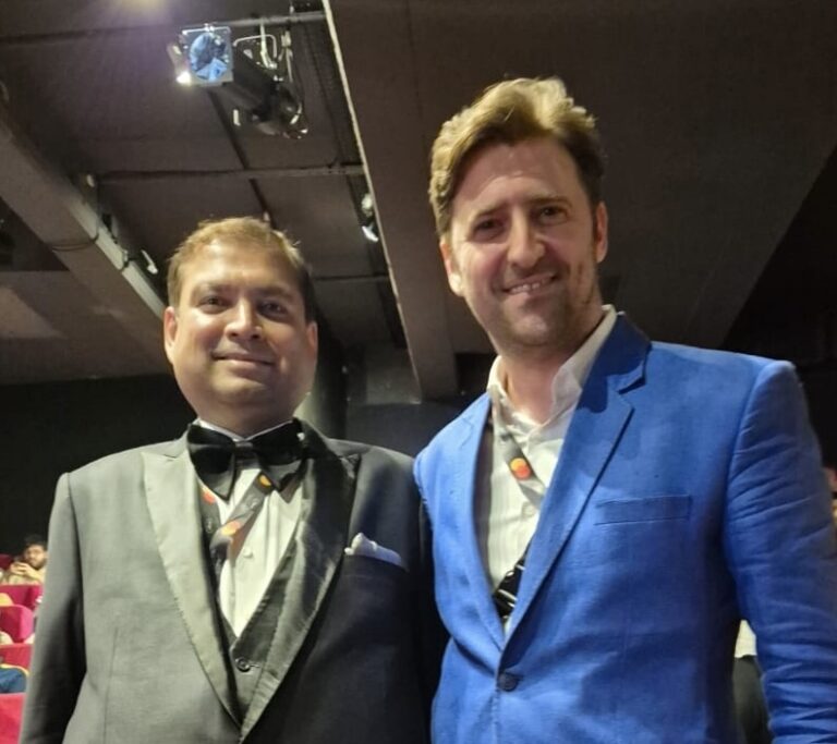 Sundeep Bhutoria with Nicola Facino in Cannes at the premiere of Aranyer Din Ratri