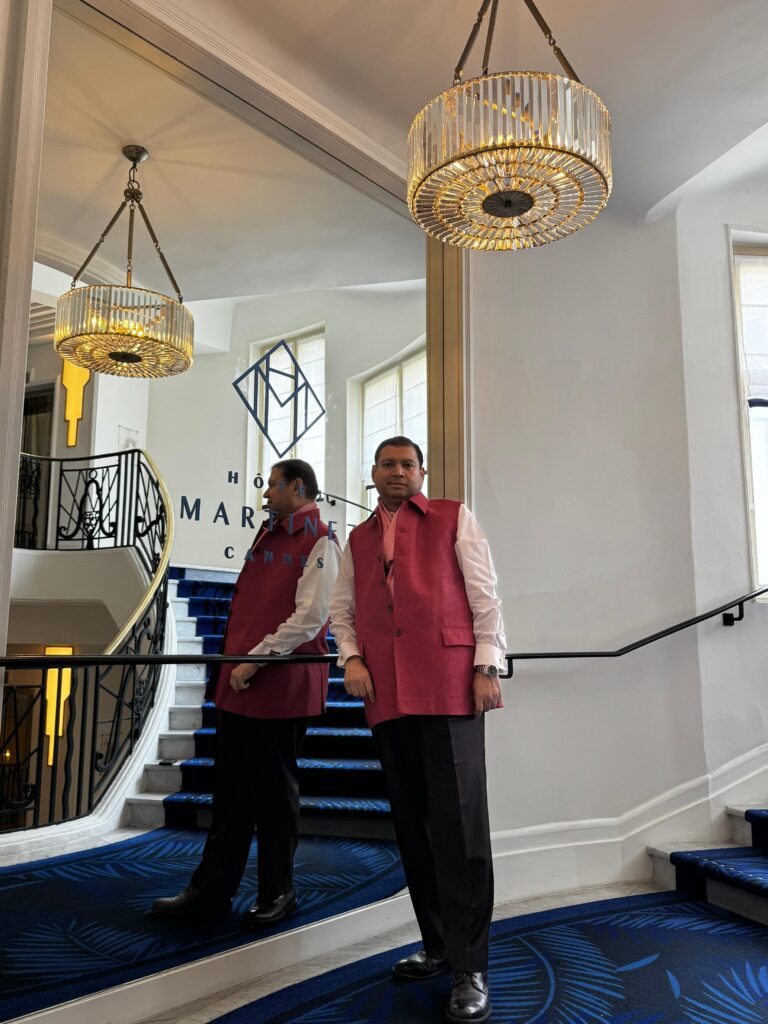 At the iconic staircase of Hotel Martinez